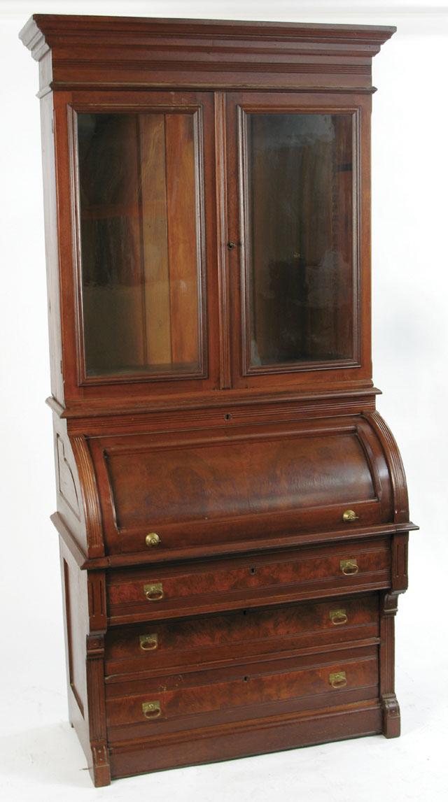 Appraisal: VICTORIAN WALNUT CYLINDER-FRONT SECRETARY BOOKCASE American C The top section