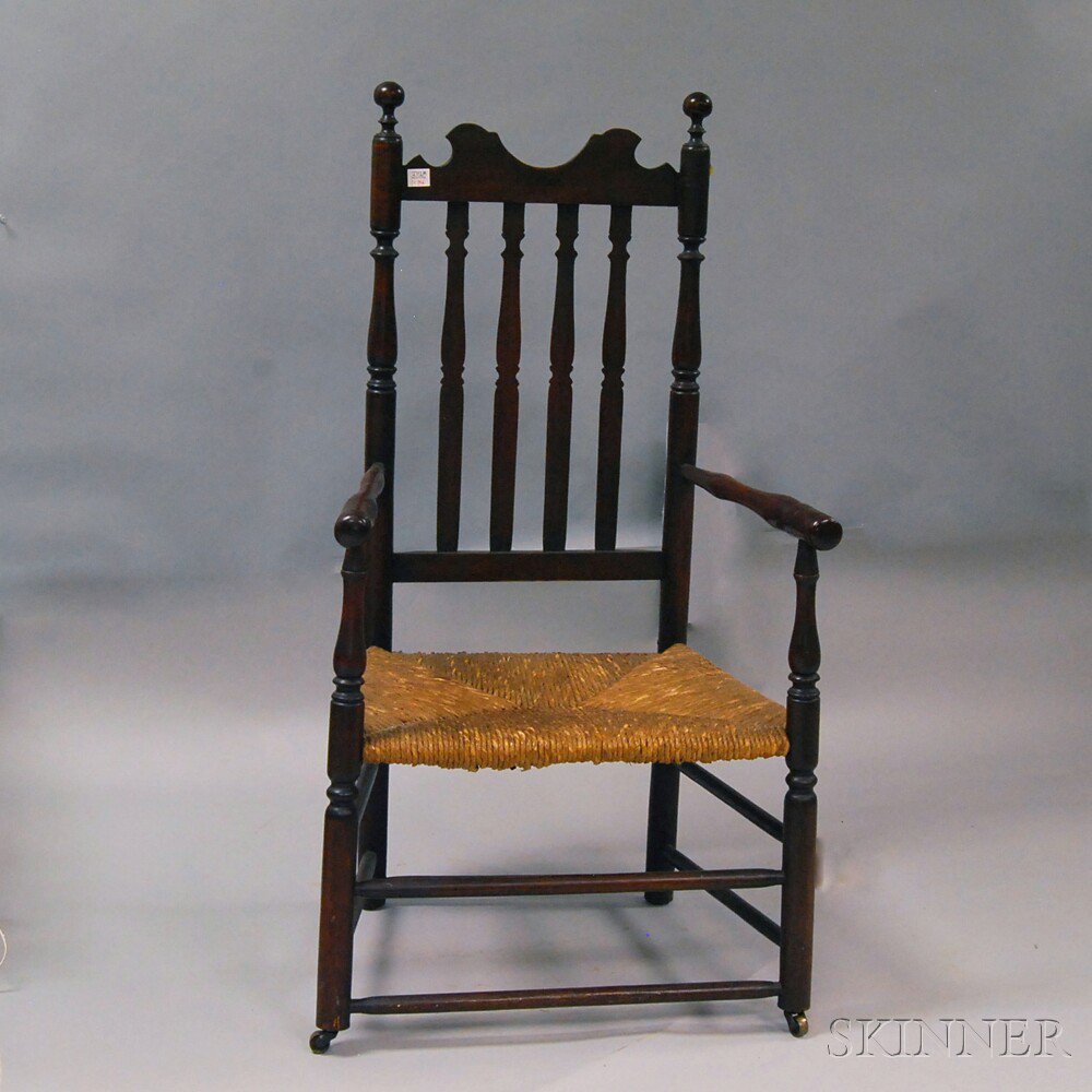 Appraisal: Bannister-back Armchair New England th century the shaped cresting and