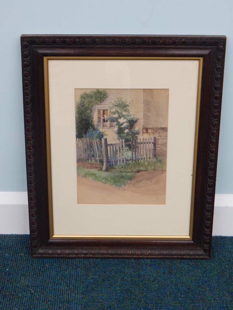 Appraisal: Late th thC School Cottage wall with flowers etc watercolour