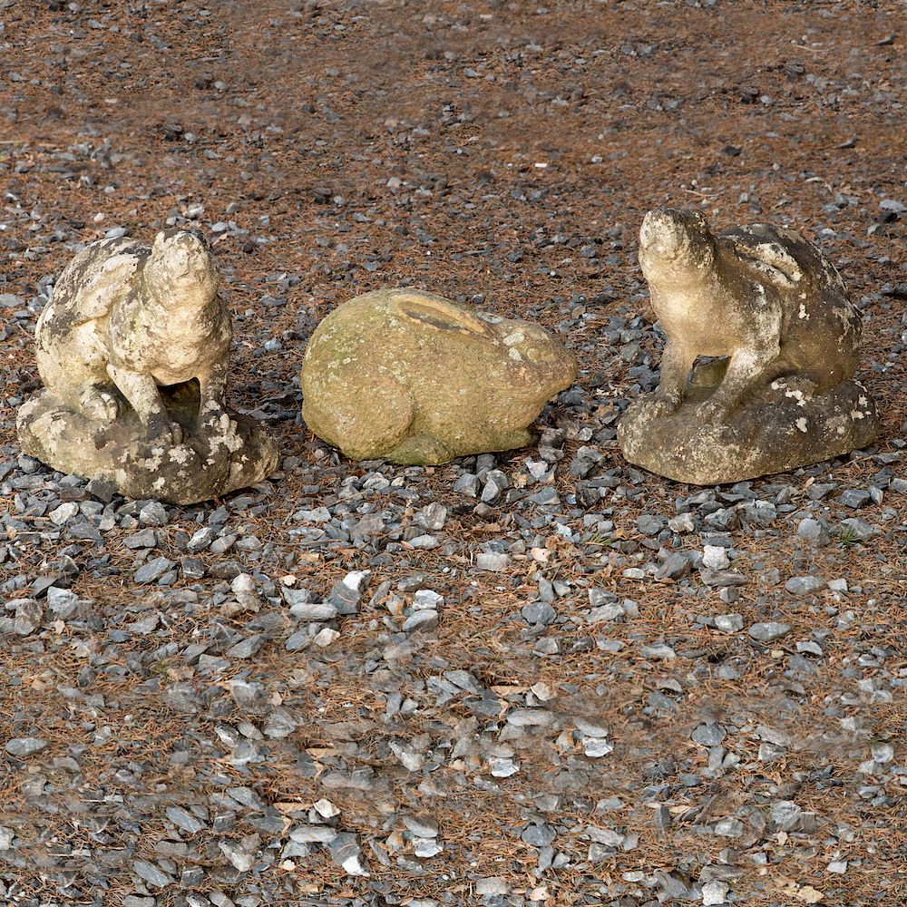 Appraisal: Three Cast Stone Rabbit Garden Sculptures Comprising a pair and