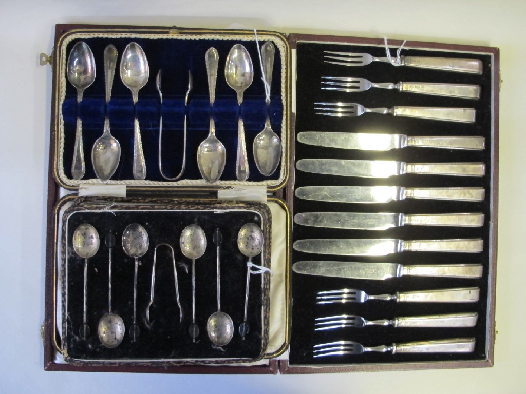 Appraisal: Lot comprising two cased sets of silver spoons and a