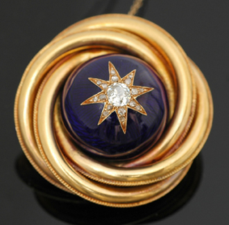 Appraisal: A Victorian enamel and diamond brooch The blue enamel domed