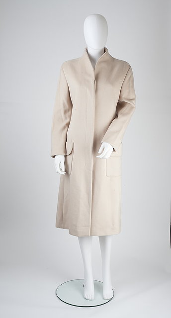 Appraisal: An Alexander McQueen pale pink cashmere coat with funnel neck