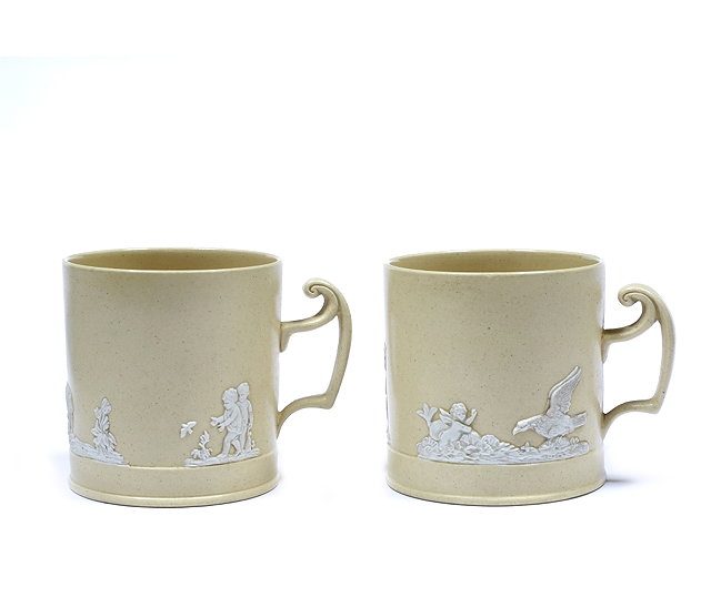 Appraisal: A pair of Brameld caneware cylindrical cups th Centuryeach with