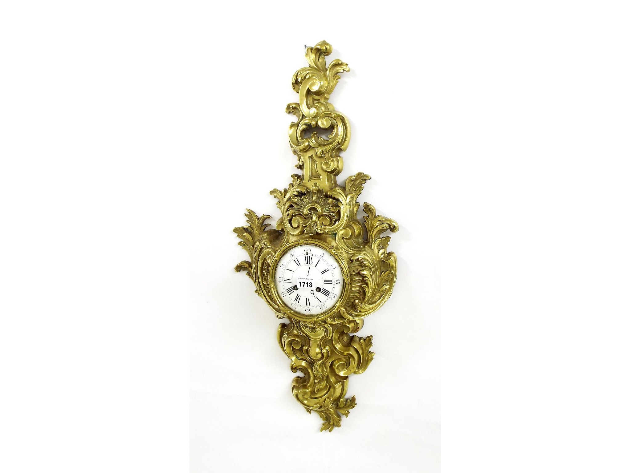 Appraisal: French gilt metal two train cartel wall clock the Vincenti