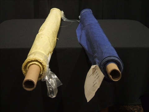 Appraisal: TWO ROLLS OF YELLOW AND BLUE FABRIC