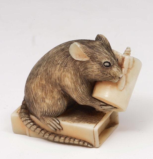 Appraisal: A Japanese ivory netsuke of a rat th Centurysigned Hoichi