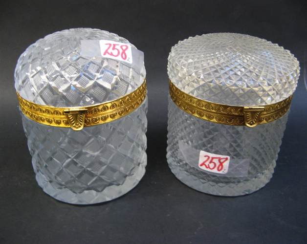 Appraisal: TWO GILT MOUNTED CUT GLASS DRESSER BOXES cylinder form having