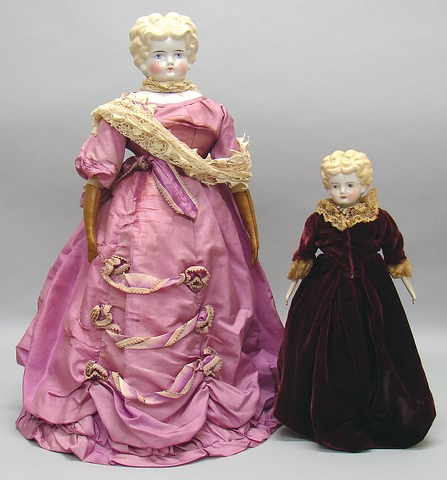 Appraisal: Pair of blonde china Lowbrow dolls Doll with what appears