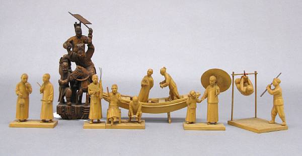 Appraisal: A group of seven small wood carvings One depicting a