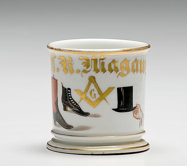 Appraisal: BOOT AND HAT MAKER'S OCCUPATIONAL SHAVING MUG porcelain with polychrome