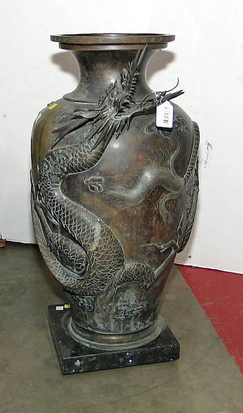 Appraisal: A monumental bronze vase Meiji Period Cast in high relief