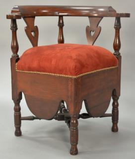 Appraisal: Mahogany corner chair with heart carved splats upholstered seat and