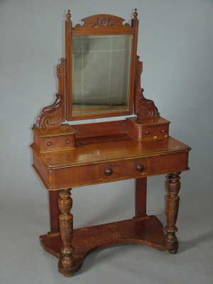 Appraisal: A late Victorian walnut duchess dressing table with swing mirror