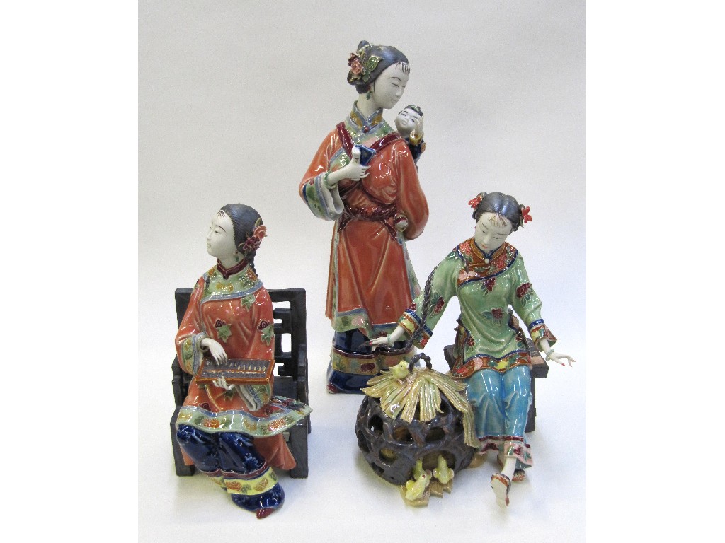 Appraisal: Three modern figures of Chinese ladies