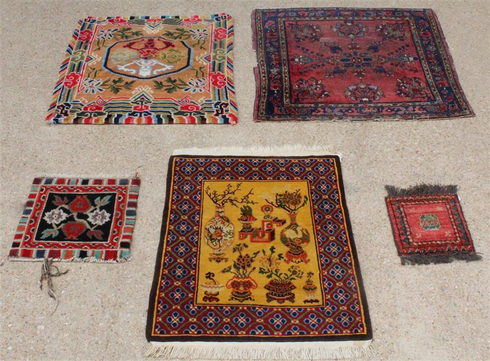 Appraisal: GROUP OF SMALL WOOL RUGS the largest with radiating floral