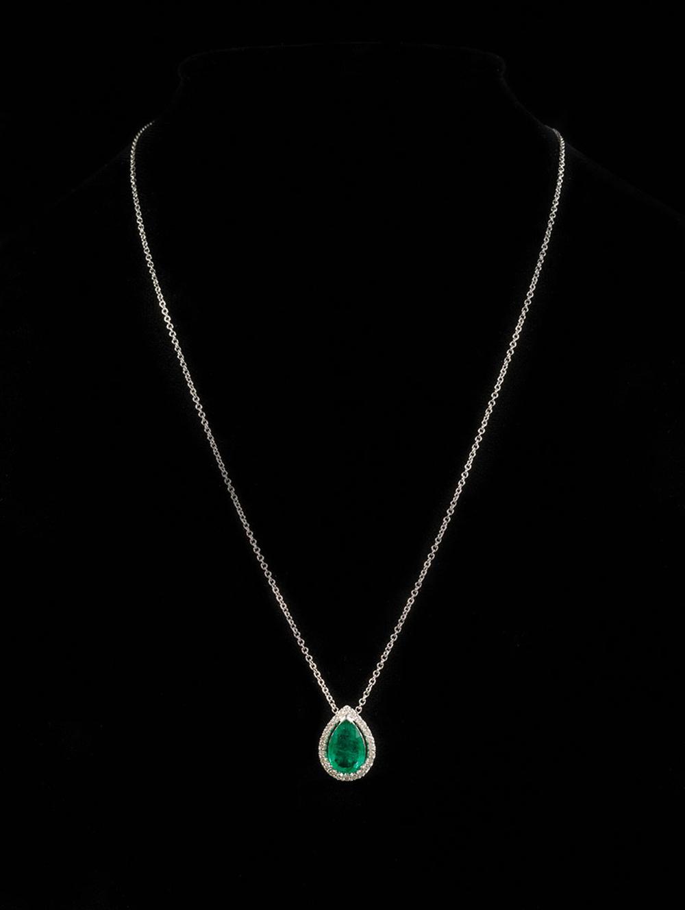 Appraisal: kt White Gold Emerald and Diamond Pendant with Chain center