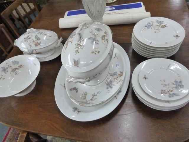 Appraisal: A LIMOGES PORCELAIN PART DINER SERVICE decorated with flag irises