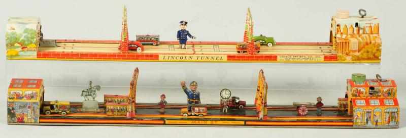 Appraisal: Lot of Tin Litho Traffic Wind-Up Toys Description American Working