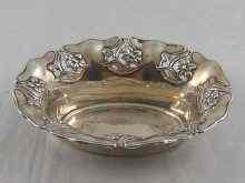 Appraisal: An Art Nouveau silver dish with embossed and pierced floral