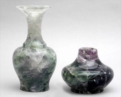 Appraisal: TWO CHINESE CARVED GREEN ROCK CRYSTAL VASES The larger of