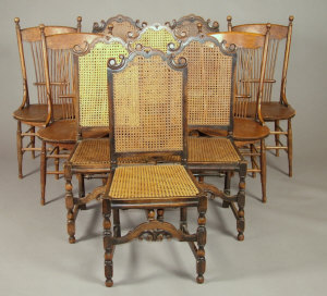 Appraisal: A set of six provincial oak and caned back dining