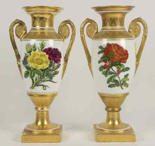 Appraisal: A pair of Continental vases painted flowers on a white