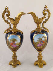 Appraisal: A pair of jugs with ceramic bodies in cobalt blue