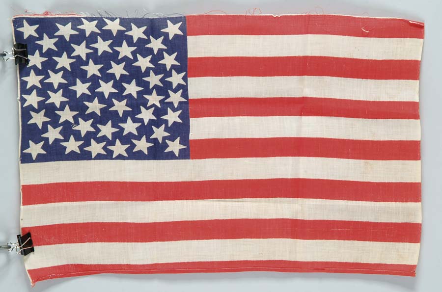 Appraisal: -STAR AMERICAN PARADE FLAG Printed cotton flag is x Canton