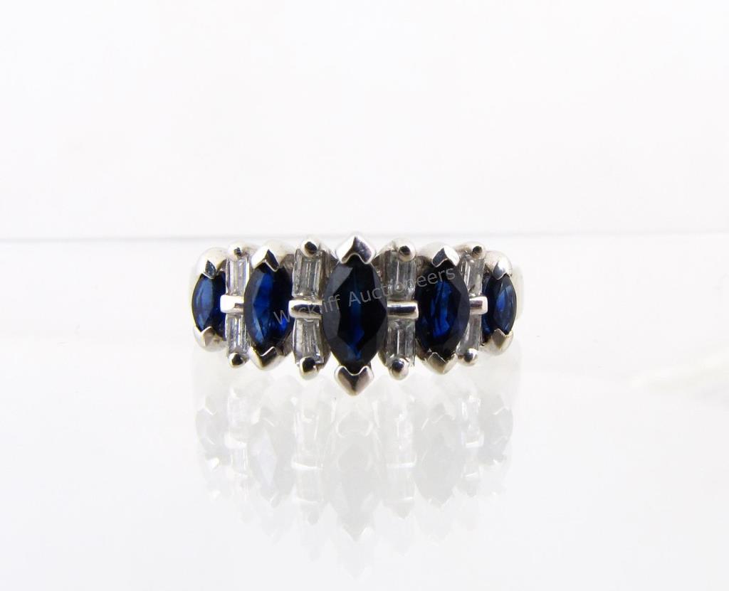 Appraisal: A K white gold band style ring with five sapphires