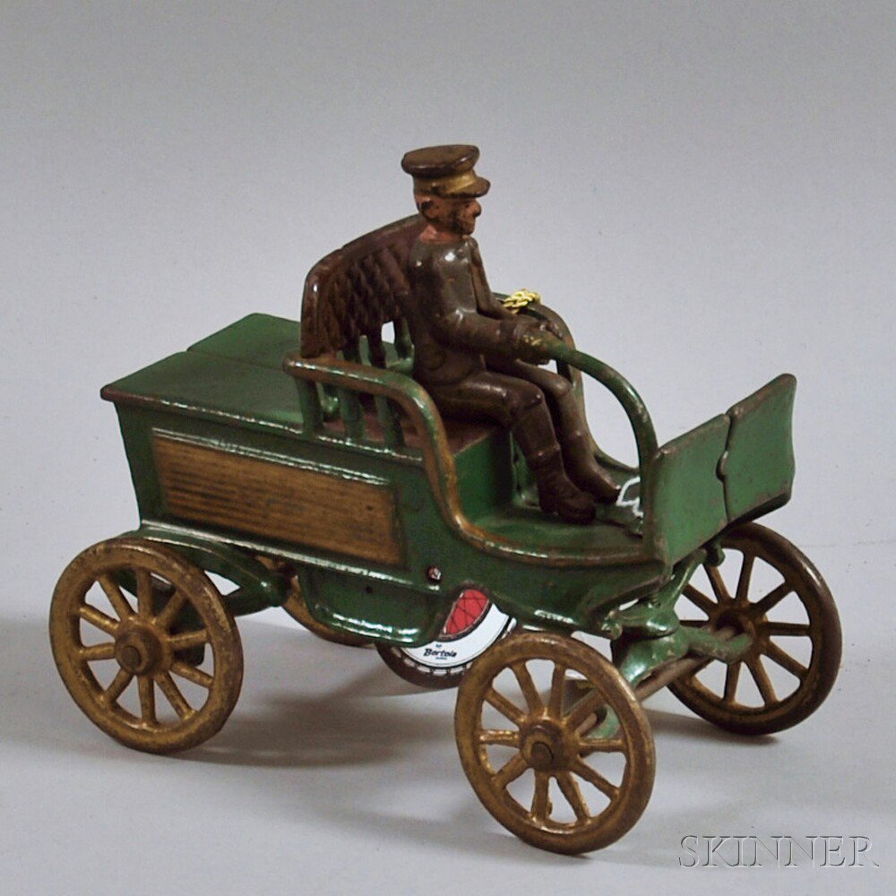 Appraisal: Antique Harris Cast Iron Horseless Carriage Toy c the green