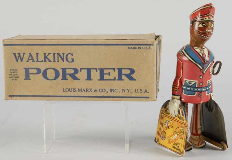 Appraisal: Tin Litho Marx Walking Porter Wind-Up Toy Description American Working