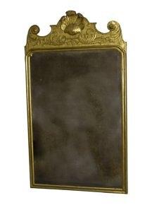 Appraisal: A George II gilt gesso wall mirror with carved shell