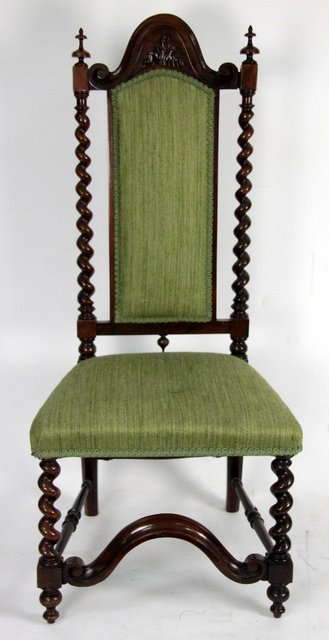 Appraisal: A Victorian walnut chair with arched back on twist turned