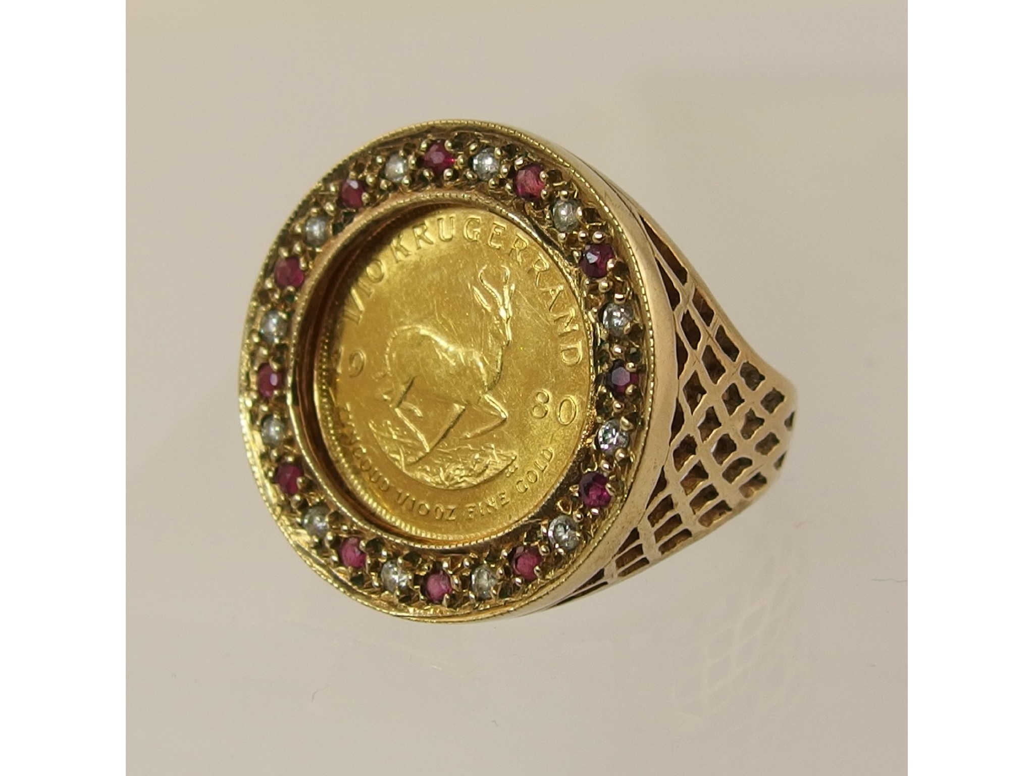 Appraisal: A gold Krugerrand from in a ct gem set ring