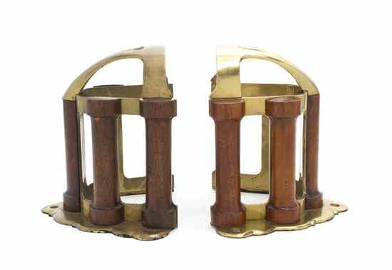 Appraisal: A Pair of Mahogany and Brass Bridle Racks of curved