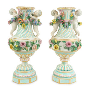 Appraisal: A Pair of German Porcelain Urns TH CENTURY marked with