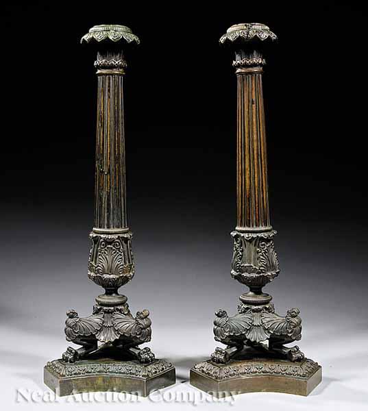 Appraisal: A Pair of French Restauration Patinated Bronze Columnar Candlesticks th