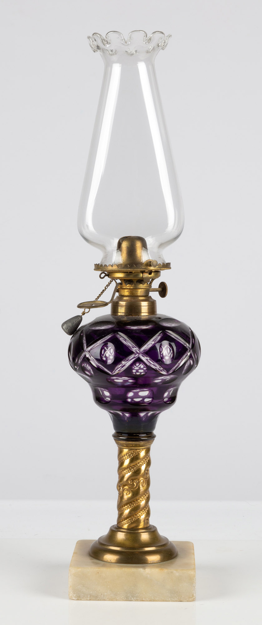 Appraisal: AMETHYST OVERLAY GEOMETRIC CUT OIL LAMP circa Deep amethyst overlay