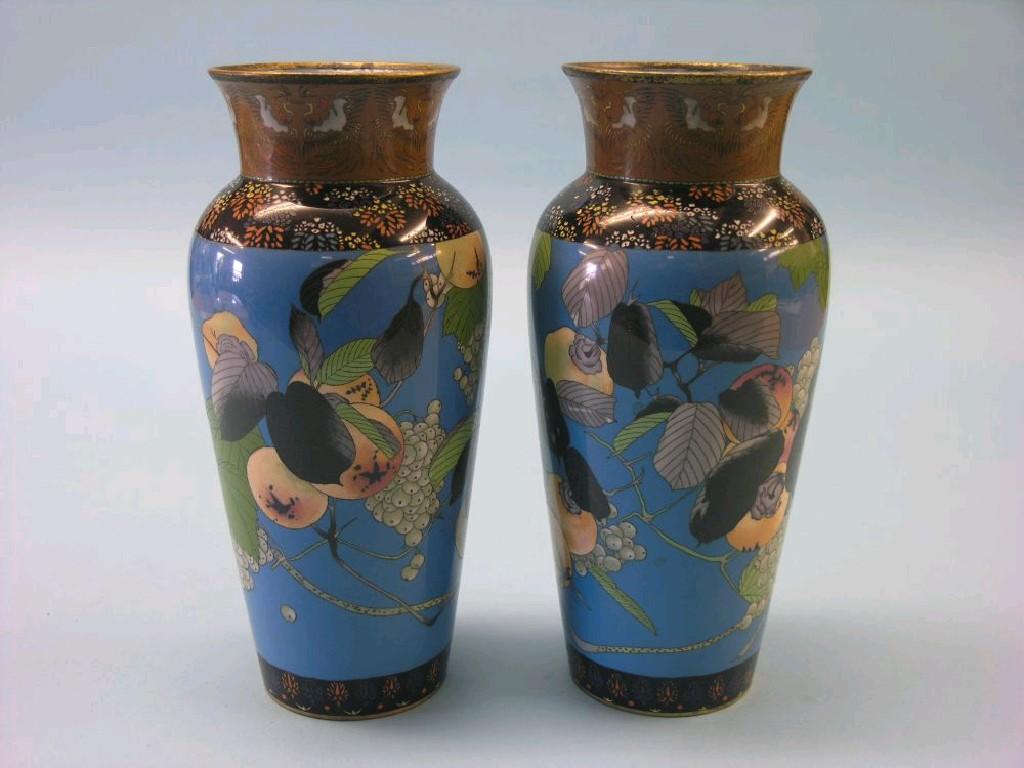 Appraisal: A pair of Japanese cloisonne vases ovoid-shape enamelled with fruit