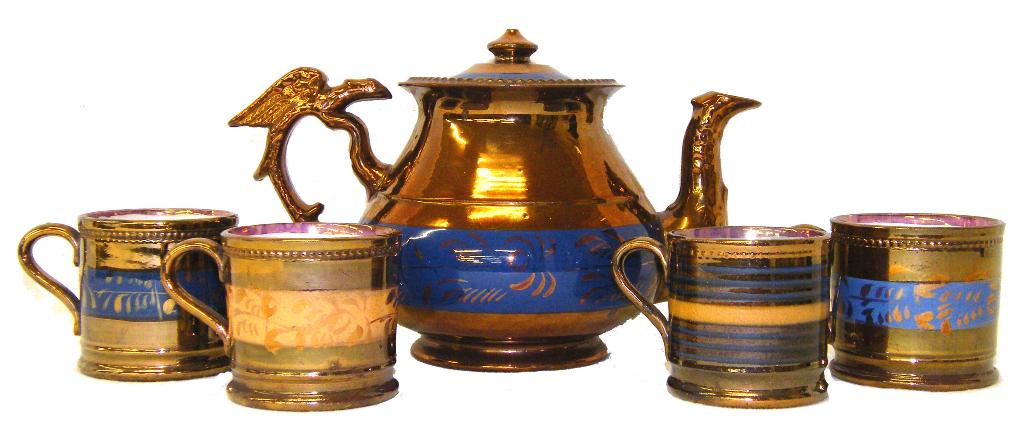 Appraisal: th century copper lustre teapot with an eagle handle high