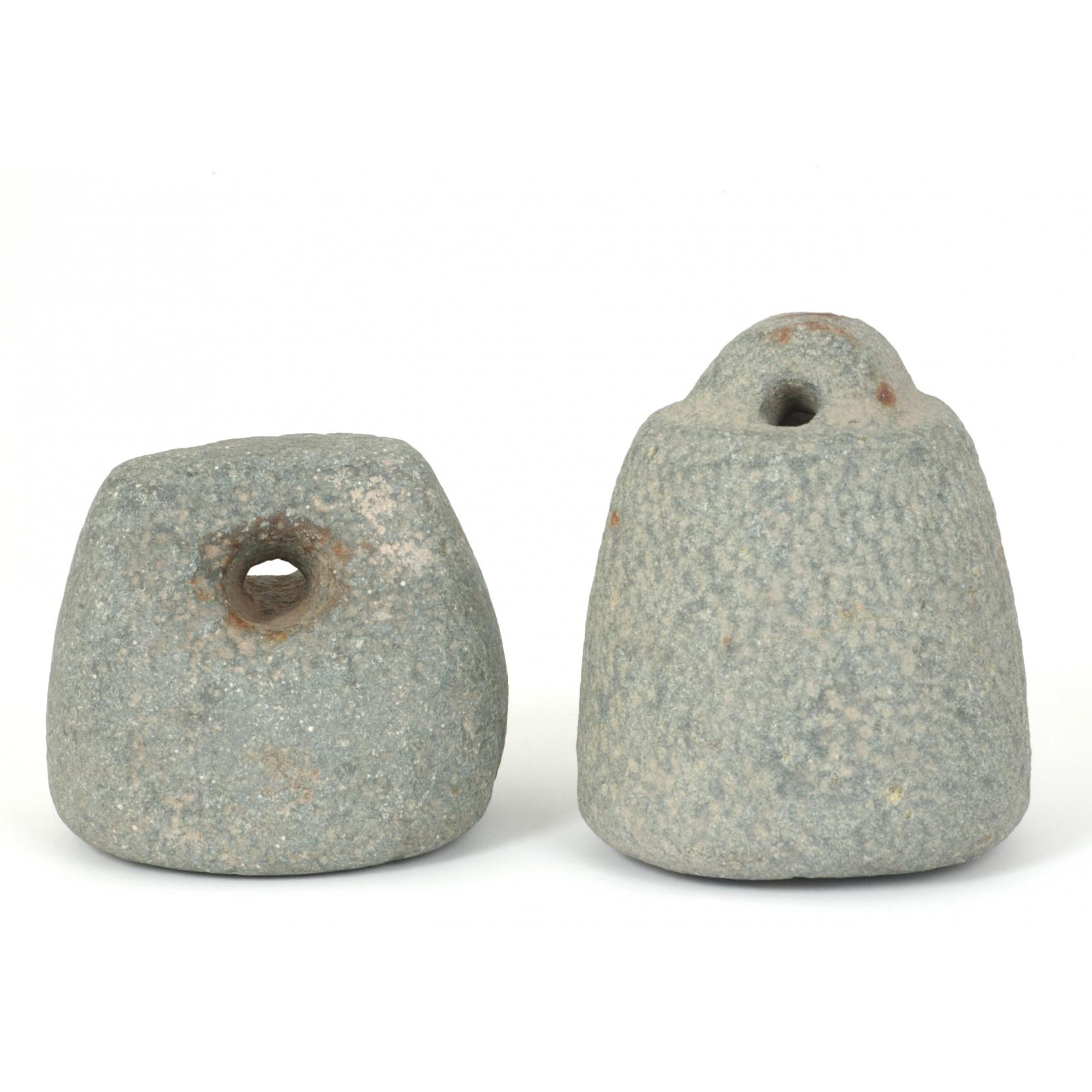 Appraisal: Two Belgian Granite Weights retailed through Axel Vervoordt each with