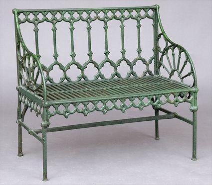 Appraisal: COALBROOKDALE-TYPE GOTHIC GREEN-PAINTED CAST IRON GARDEN BENCH The openwork back