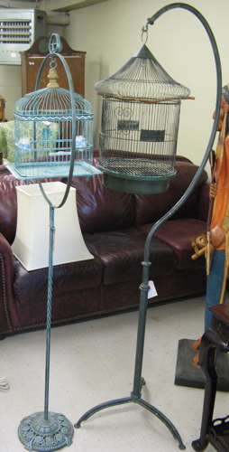 Appraisal: TWO BIRDCAGES EACH WITH FLOOR STAND cylindrical birdcage with conical