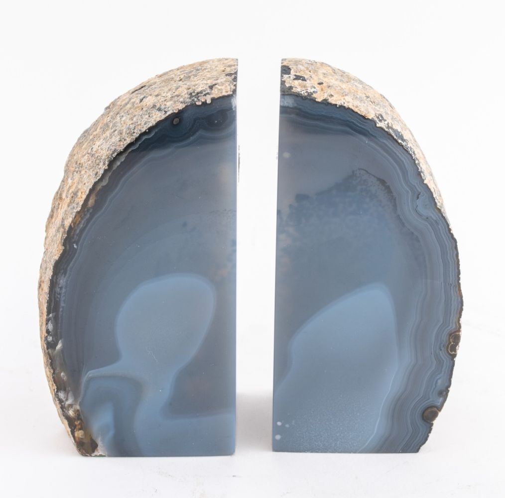 Appraisal: BLUE GRAY CRYSTAL GEODE BOOKENDS PAIR Pair of blue gray