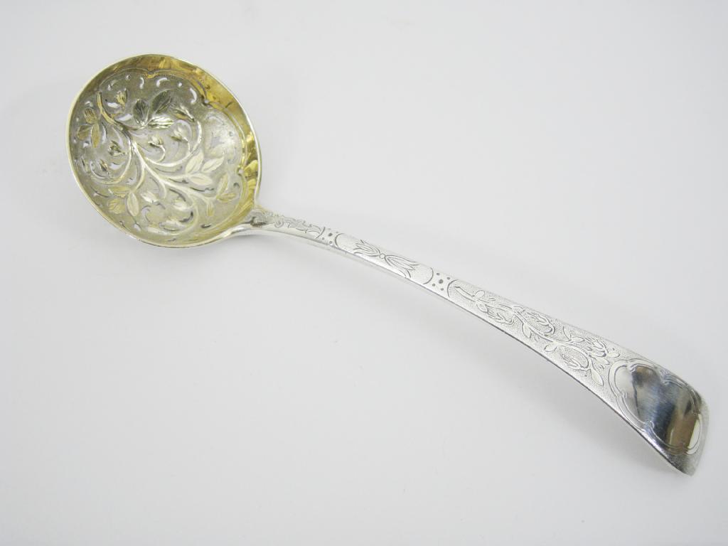 Appraisal: A Victorian Sifting Spoon Old English pattern with engraved decoration