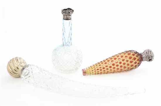 Appraisal: Three Cut Glass Perfume Bottles comprising a flattened tapering example