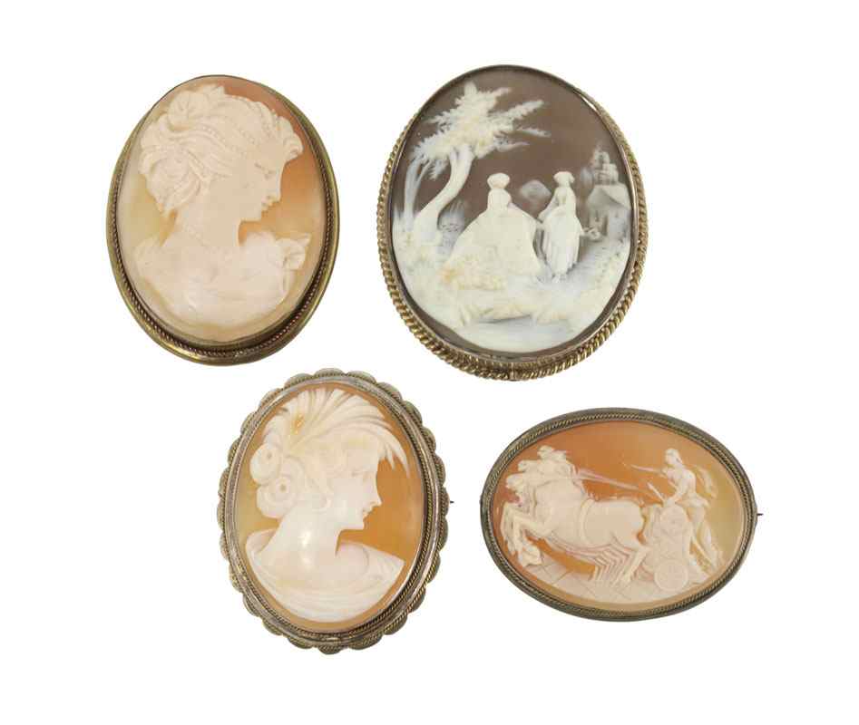 Appraisal: LOT OF CARVED SHELL CAMEOS Female profile with feather in