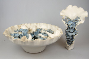 Appraisal: Two Chessell Porcelain floral sculptures in the form of a