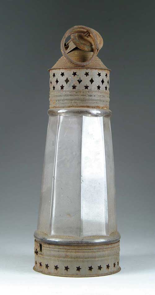 Appraisal: EARLY LIGHTHOUSE SHAPED TIN AND GLASS LANTERN Eight paneled glass